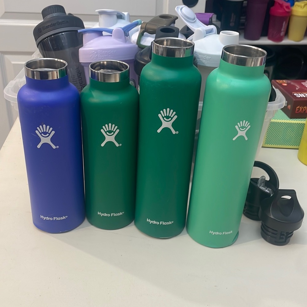 4 Hydroflask water bottles